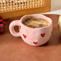 Ceramic cup with red heart and handle